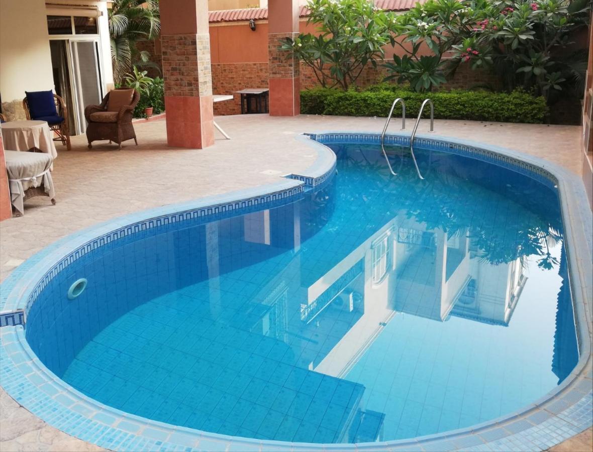 Hidden Gem With Pool Access In New Cairo Apartment ภายนอก รูปภาพ