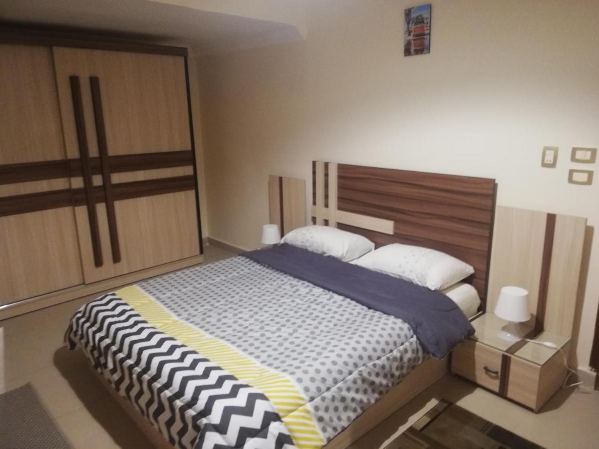 Hidden Gem With Pool Access In New Cairo Apartment ภายนอก รูปภาพ