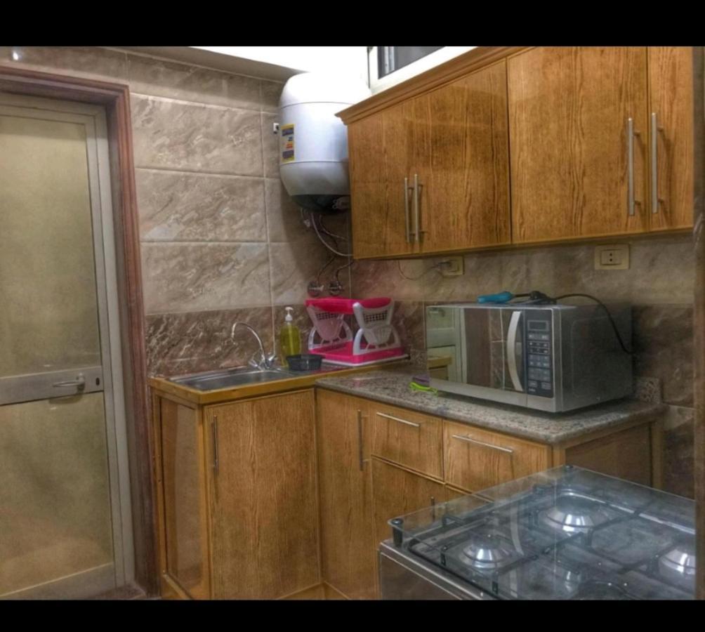 Hidden Gem With Pool Access In New Cairo Apartment ภายนอก รูปภาพ